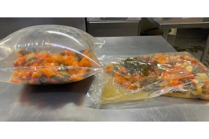 puffed sous vide bag with food inside