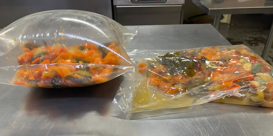 puffed sous vide bag with food inside